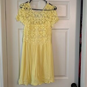 Beautiful yellow spring time dress sold by Southern Fried Chics size medium